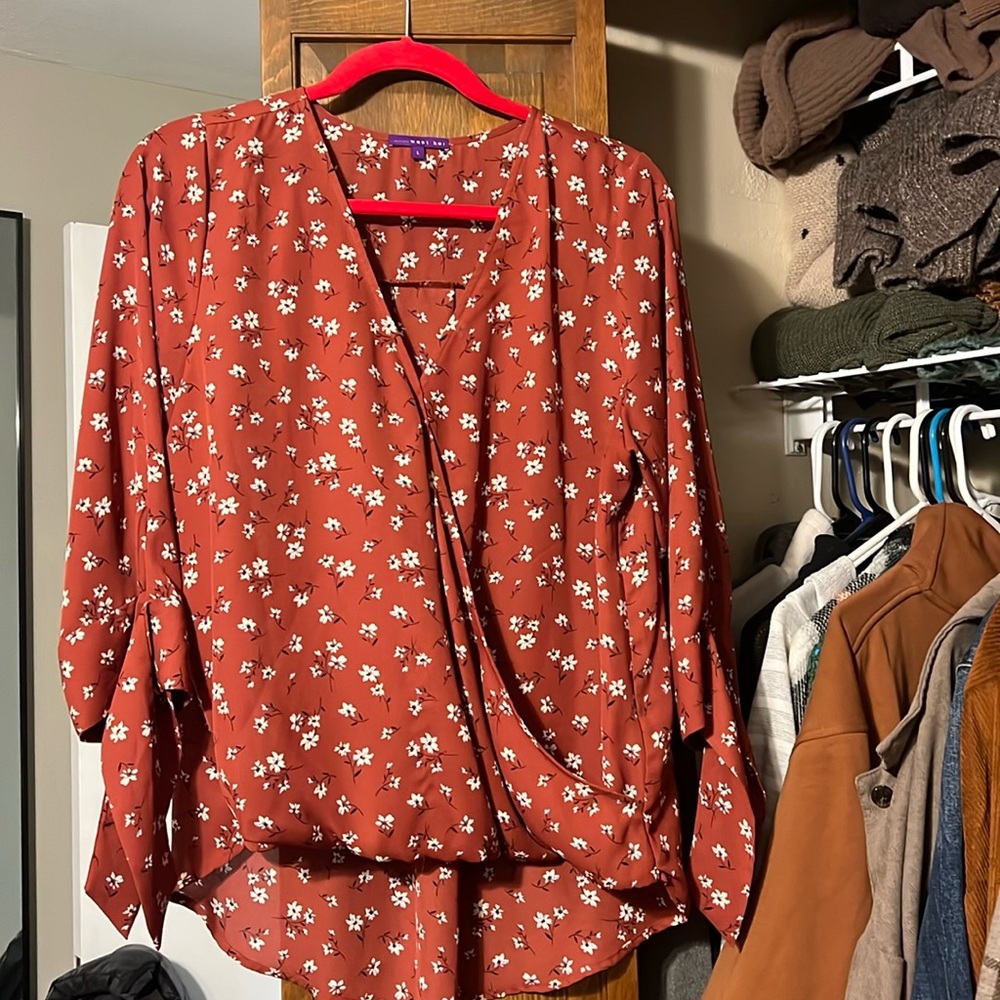 Red floral blouse
